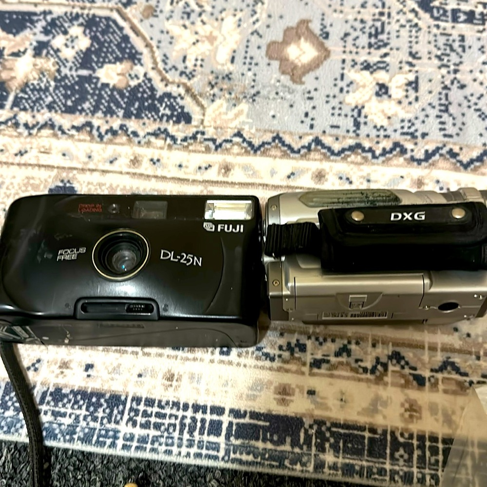 Fuji old fashioned photo camera and camcorder  DXG in working condition.